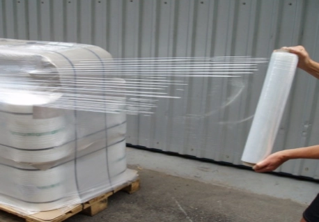 Hand stretch film applied around a pallet